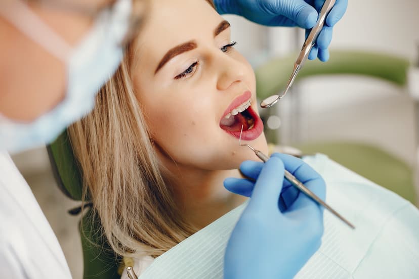 Dental professional working with patient
